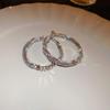 Pendientes de anillo liso transfronterizos europeos y americanos con aguja de plata, pendientes de nicho de viento frío, pendientes de temperamento de moda, lujo ligero, sentido de alta gama