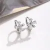 Selección de arte Arete de flor de cinco pétalos de diamante estilo coreano aretes pequeños temperamento suave Mori nueva hebilla de oreja de flor de circonita
