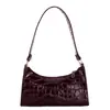 El popular bolso texturizado de este año para mujer, nuevo modelo de otoño 2026, bolso de hombro de color liso con patrón de cocodrilo, bolso de moda para llevar debajo del brazo