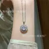 Venta al por mayor del fabricante Colgante Pequeño de Piedra de Luna Roja Natural Cielo Estrellado Plata S925 Incrustada Diseño Pequeño Fresco y Exquisito