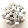 Fábrica em estoque pedra rolante de cristal partícula grande polimento expansão aromaterapia pedra decoração aquário peixe Buda atacado