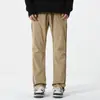 Pantalones de trabajo para hombre Jianheng, pantalones casuales rectos de otoño, softshell, impermeables, cortavientos, pantalones casuales de moda estilo americano