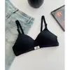 Nueva versión fina para niñas, directo del fabricante, ropa interior sin costuras push-up para busto pequeño anti-caída para mujeres, sujetador sin varillas