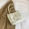 Versión coreana 2026 nuevo elegante y con estilo bolso de mano con estampado vintage de un solo hombro, color contrastante, mariposa, con textura bajo el brazo