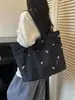 Bolso tote simple de gran capacidad, nuevo bolso tote casual de lona de color liso, estilo moderno, bolso de hombro para el trabajo, principios de otoño 2026
