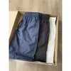 Pantalones cortos para hombre populares de empalme de nicho transfronterizos, pantalones cortos Oxford de secado rápido de moda, pantalones cortos casuales holgados para hombre