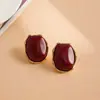 Pendientes ovalados de perla de resina con aguja de plata transfronterizos europeos y americanos, lujo ligero y elegantes, accesorios para la oreja simples y versátiles