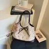 Bolsa Grande de Verano 2026 Exquisita de Gran Capacidad Transfronteriza Bolso de Hombro o Axila para Mujer Bolso Tote para Viajes