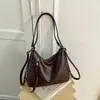 Bolsa Tote de Moda para Viajes de Otoño 2026 Mochila Retro de Gran Capacidad Bolso de Hombro Cruzado Simple de Color Sólido