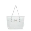 Bolso de mano de estilo fresco y moderno para mujer 2026 Verano Nuevo Patrón de Estrella Bolso de Hombro Termoadhesivo Bolso para el Trabajo Debajo del Brazo