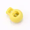 Fivela de mola de bola colorida fivela de cordão de cordão de furo único fivela de aperto de cordão elástico fivela de nariz de porco em forma de bola de plástico