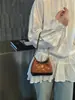 Verano 2026 Nuevo Estilo Coreano Ins Cubo Moda Bolso para Niña Pequeña Cadena con Patrón de Diamantes Cruzado Bolso para Mujer al por Mayor