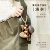 Colgante de Bolso con Cáscara de Fruta de Planta Natural Sonajero Hecho a Mano Terapia de Sonido Campana Colgante Adorno para Mochila Estilo Mori Campana de Viento Curativa Colgante para Coche