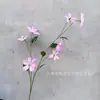 Nuevo Modelo de Flores Artificiales de Clemátide de 7 Cabezas en Stock, Arte Floral para el Hogar, Decoración de Pasillo de Boda, Adornos de Flores Artificiales para el Hogar