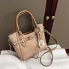 Bolsa de Ombro Única Feminina de Nova Moda Transfronteiriça com Fivela Texturizada, Grande Capacidade, Tendência para o Trabalho, Versátil, Bolsa Transversal Diagonal de Celebridade da Internet