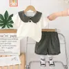 Traje de Verano para Bebé Niña de Manga Corta 2025 Estilo de Verano para Niños Cuadros Cuello Muñeca Shorts Conjunto de Dos Piezas