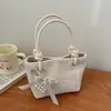 Primavera 2026 Nuevo Estilo Personalizado de Moda Nicho Diseño Texturizado Bolso Cubo Moda Coreana Bolso de Hombro Simple