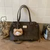Bolso de Mano tipo Tote Retro Simple de Gran Capacidad para Mujer 2025 Invierno Nuevo Estilo Ropa de Trabajo Versátil Diario Mochila de un Hombro