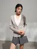 Suéter de punto de imitación de dos piezas para mujer, nuevo diseño de otoño 2026, corte ajustado, top tipo cárdigan con textura de raya vertical