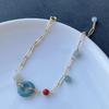 Pulseira de donut de água azul gelo de jade natural com corrente de ouro 14k Butterfly Live Supply