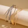 Pulsera Abierta Geométrica de Capas Cruzadas con Brillo Metálico Europea y Americana con un Toque Único Minimalista de Nicho de Alta Gama, Joyería Transfronteriza