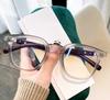 Nuevas gafas TR90 m con montura redonda y diseño de uñas, estilo retro, con patas de madera y antiluz azul, a juego para hombres y mujeres.