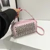 Bolsa de Mano Popular de Comercio Exterior para Mujer 2024 Nuevo Bolso de Hombro Coreano con Remaches Bolso Cruzado Cilíndrico Personalizado de Moda