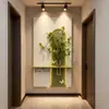 La pintura de arena de la Galería de Arte Qiaojia para el vestíbulo es una pintura decorativa de alta gama que se puede usar para cultivar plantas verdes, y es una pintura de pared colgante con luces para la pared del fondo.