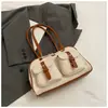 Bolso tipo almohada de diseño retro de nicho para mujer 2026 Nuevo de gran capacidad para el trabajo, el trayecto diario, bolso de mano, bolso de hombro, bolso de axila