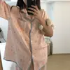 Pijama de moda de alta gama con estampado de estrellas para mujer, conjunto de dos piezas de verano con ribetes de contraste, manga corta y shorts, adecuado tanto para estar en casa como para usar al aire libre.