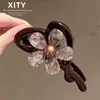 Grampo de garra grande flor coração elegante francês temperamento nuca muito cabelo penteado todo preso grampo tubarão atmosfera