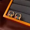 Pendientes de borla con flor de trébol de circonita vintage con un toque de alta gama, pendientes versátiles y de moda al por mayor