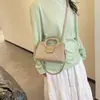 La súper popular bolsa de moda nueva de este año para mujer es un bolso de hombro acolchado de moda 2026, bandolera elegante con cadena, lujo ligero