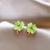 Brincos de Flor de Quatro Pétalas Estilo Fresco Agulha de Prata Pedra Olho de Gato Brincos Simples Versáteis com Design de Coração Brincos da Moda para o Dia a Dia para Mulheres