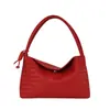 Bolso tejido de diseño de nicho de verano para mujer, nuevo modelo 2026, versátil para el trabajo, bolso de un solo hombro para llevar debajo del brazo, bolso de mano pequeño para salir