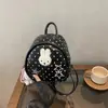 Mochila fofa de coelho com bolinhas estilo coreano para mulheres, mochila escolar de desenho animado de design nichado para estudantes, mochila versátil de grande capacidade