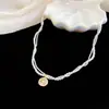 Collar de perlas y cuentas de doble capa con estrella de circón estilo francés, cadena para la clavícula de lujo ligero de alta gama, gargantilla versátil