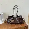 Bolsa de ombro de couro macio de luxo retrô de nicho para mulheres, grande capacidade, perfeita para passeios de outono e deslocamento, estilo baguete de axila