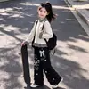 Conjunto Nuevo de Primavera y Otoño para Niñas 2026: Conjunto de cárdigan de punto a cuadros color block con ribete de encaje dulce y pantalones de pierna ancha
