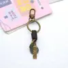 Llavero tejido a mano de fábrica hebilla de puerta accesorios cuerda de cuero versátil retro accesorios de colgante semiacabados para DIY