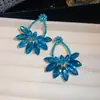 Novos brincos de agulha de prata com design de flor oca em formato de leque cravejada de diamantes, luxo leve e sensação de alta qualidade, design de nicho, brincos da moda