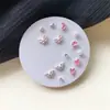 Set de Aretes de Una Semana Combinación Simple Pequeña Aretes Estilo Coreano para Mujer Estilo Estudiante Simple Aretes de Presión Elegantes Versátiles