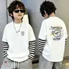 Camiseta de algodón 100% pura para niño, nueva de 2026, ropa infantil, imitación de dos piezas, manga larga, rayas, retazos, para primavera y otoño
