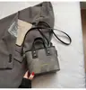 Bolso de Mano de Estilo Moderno y Fresco para Mujer 2026 Nuevo Modelo Bolso de Hombro Bolso Cruzado de Moda Bolso Cubo de Textura de Nicho Bolso Casual para Mujer