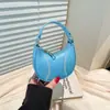 Bolsa Infantil 2026 Nuevo Otoño e Invierno Nicho Alta Gama Mini Bandolera Debajo del Brazo Forma de Media Luna Bolso de Mano Bolsa de Béisbol