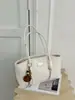 Bolso de axila para mujer elegante y a la moda, nuevo modelo de primavera, versátil, único, simple, color liso, gran capacidad, bolso de hombro de moda para el día a día