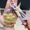Chaveiro Dourado Desenho Animado Cachorro Pudim Ouro Puro 999 Cordão para Celular Pingente de Bolsa Atração de Clientes Presente Venda por Atacado