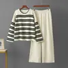 Conjunto casual de dos piezas a rayas, nuevo para Otoño/Invierno 2026, transfronterizo: Suéter holgado + Pantalones deportivos casuales de pierna ancha para mujer