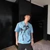 Camisa de Manga Curta Azul Estampada Estilo Resort Ilha de Verão Moda Preguiçosa Casual Solta para Homens