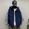 Chamarra con capucha de tres franjas transfronteriza para hombre, para primavera y otoño, talla grande, chaqueta deportiva exterior a prueba de viento para jóvenes, abrigo moderno